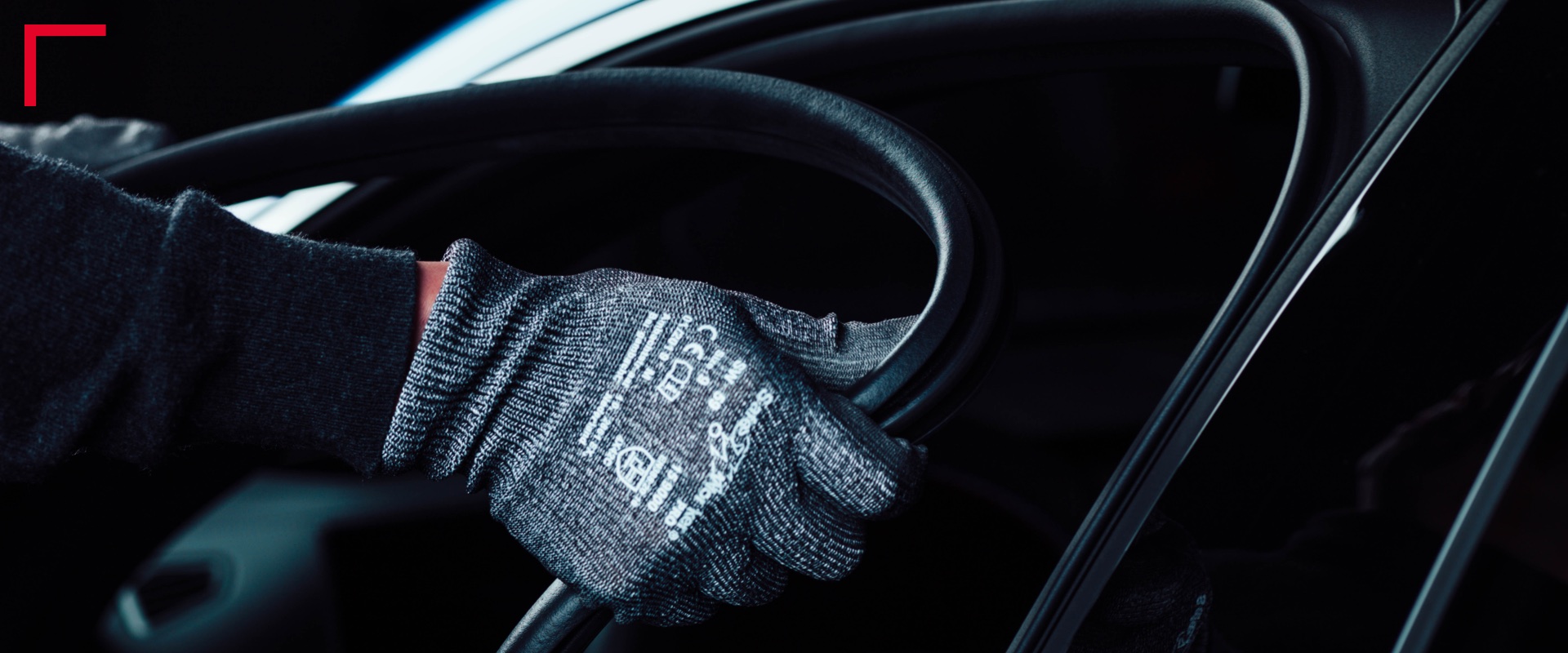 Hands with gloves adding sealing to a car Image