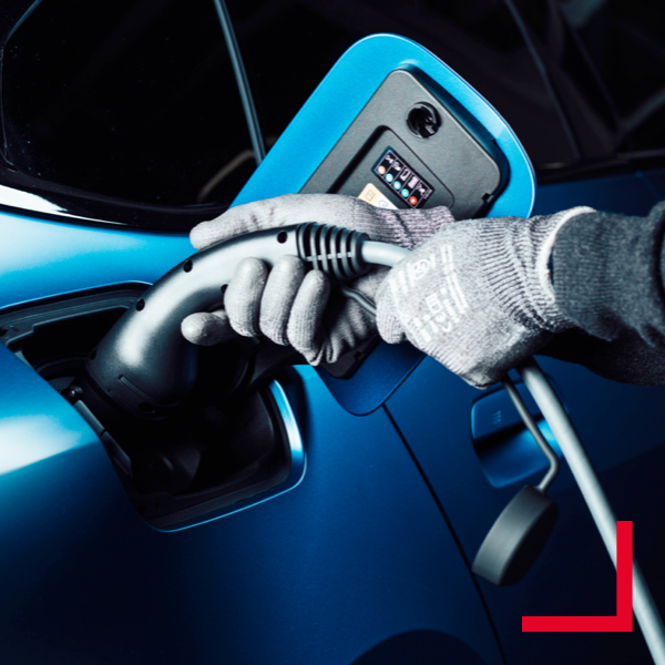 Blue car gets charged  Image